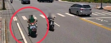 機車載運油漆桶涉超高超載